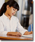 Homeschool girl in a white shirt taking a standardized achievement test with a pencil